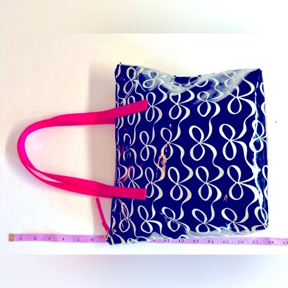 Kate Spade New York- Daycation black tote with white bows and pink handle. - Picture 4 of 7